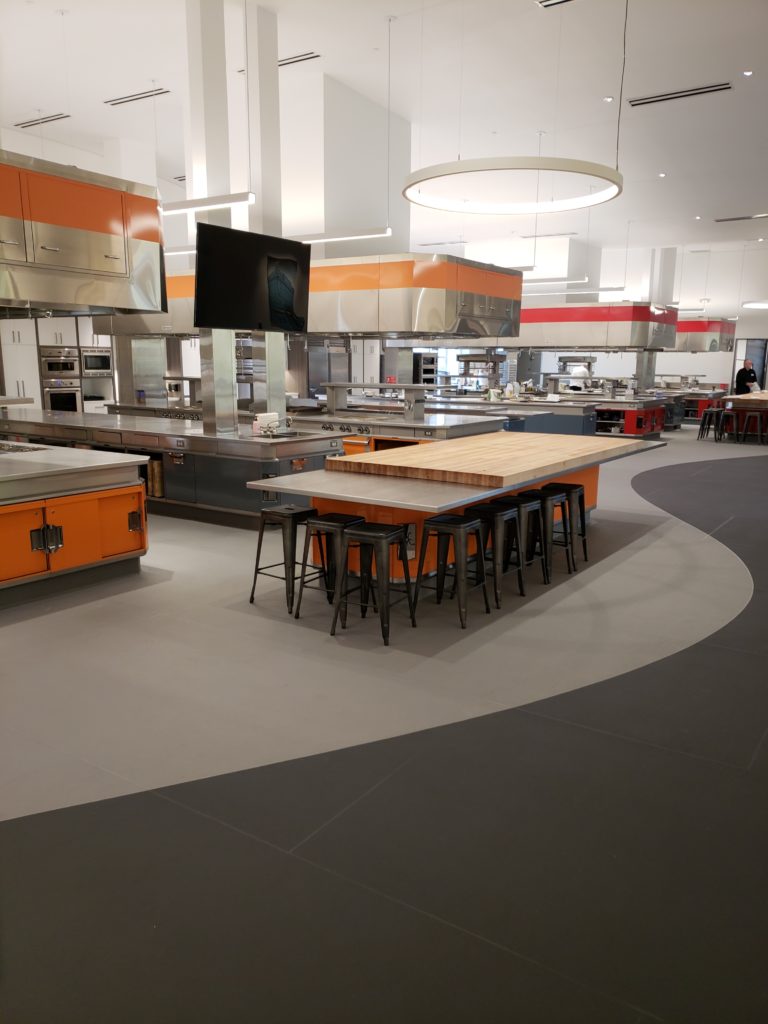 Colorful cooking school photo featuring eco-grip safety flooring