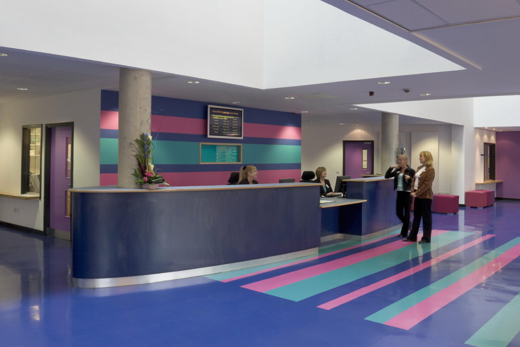 Allstate rubber flooring in a large colorful lobby