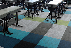A classroom featuring colorful Procedo Loom Woven flooring