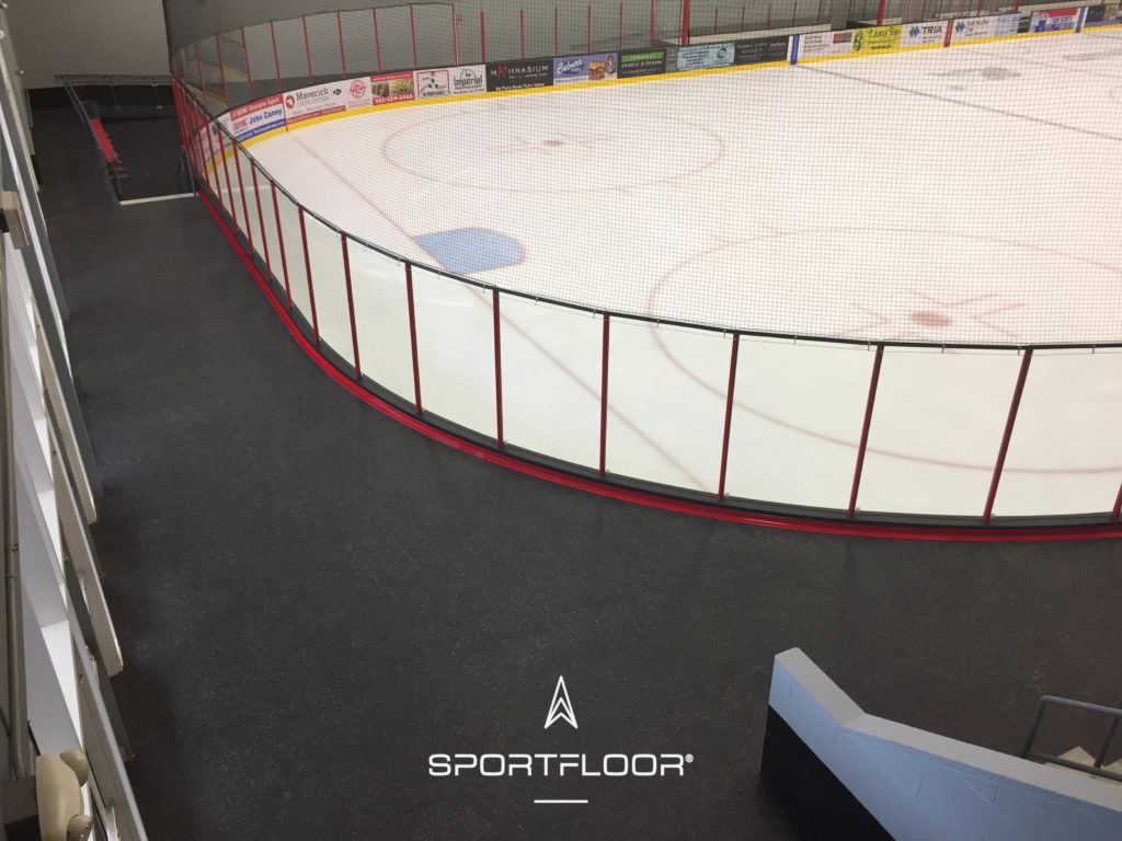 Shakopee ice hockey arena featuring rubber safety flooring around seating area