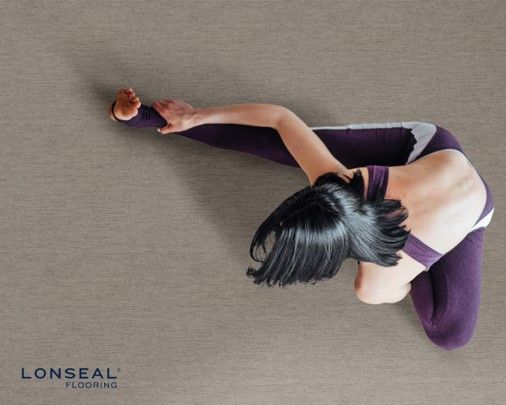 Top down woman doing yoga on Lonseal flooring
